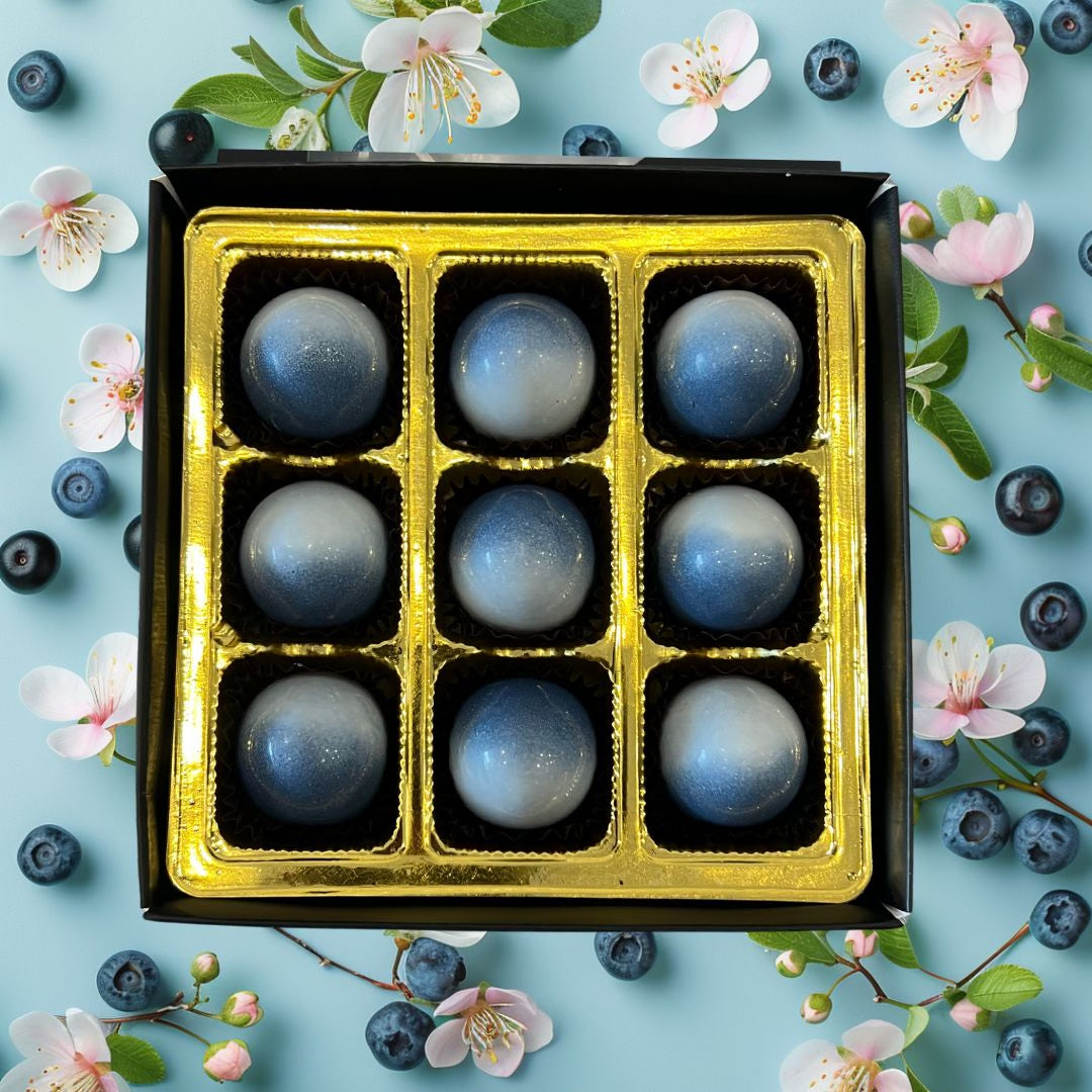 chocolats noirs farcis ganache et guimauve aux bleuets