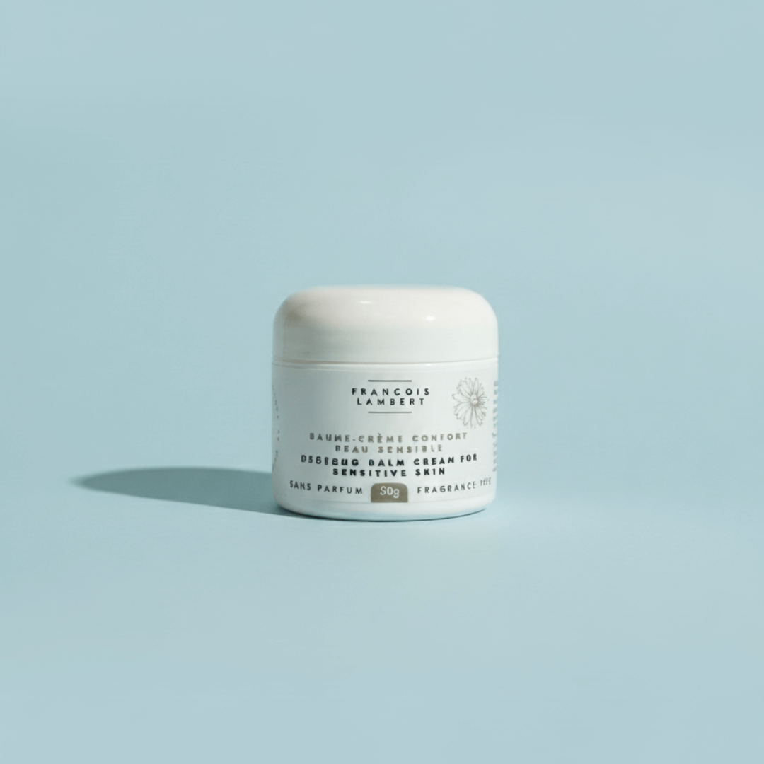 pot de creme blanc sur fond bleu psorasis